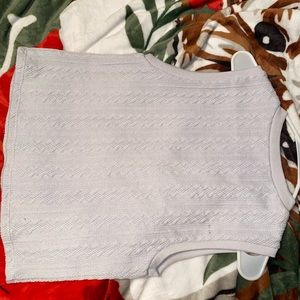 Off white sweater vest.